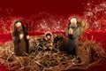 Traditional Christmas decoration. Nativity scene. Red background with lights Royalty Free Stock Photo