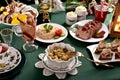 Traditional Christmas Eve dishes on festive table Royalty Free Stock Photo