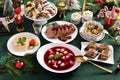 Traditional Christmas Eve dishes on festive table Royalty Free Stock Photo