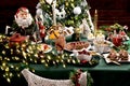 Traditional Christmas Eve dishes with red borscht in star shaped bowl on festive table Royalty Free Stock Photo