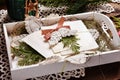 Traditional Christmas Eve wafer lying on hay in wooden tray Royalty Free Stock Photo