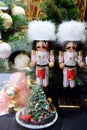 Traditional Christmas holiday nutcrackers figurine ornament. Wooden nutcrackers as a Christmas window installation