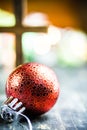 Traditional Christmas Holiday Ornaments and Christian Cross on a Royalty Free Stock Photo
