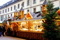 Traditional christmas market in the historic center of Nuremberg, Germany. Decorated with garland and lights sale stalls
