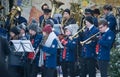 Traditional Christmas Market in Niederstetten and Local Orchestra Playing Christmas Songs. Royalty Free Stock Photo
