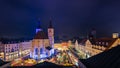 The traditional famous Christmas market on the Neupfarrplatz in Regensburg in December seen from roof terrace at night