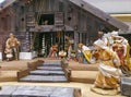 Traditional Christmas nativity scene with beautiful figures made out of wood. The birth of Jesus Christ in the manger surrounded Royalty Free Stock Photo