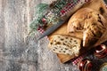 Traditional Christmas panettone with chocolate chips and christmas ornaments