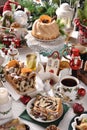 Traditional Christmas pastries on festive table with decors Royalty Free Stock Photo