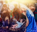 Traditional Christmas scenes and shining holy lights to use in design. Nativity scene of baby Jesus in a manger Royalty Free Stock Photo