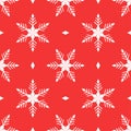 Traditional Christmas seamless pattern of white snowflakes on red background Royalty Free Stock Photo