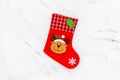 Traditional christmas stocking on white background top view copy space Royalty Free Stock Photo