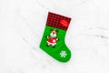 Traditional christmas stocking on white background top view copy space Royalty Free Stock Photo