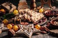 Traditional christmas stollen fruit cake with cookies on festive table Royalty Free Stock Photo