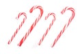 Traditional christmas sweets, candy cane sweets on white background, top view. Copy space Royalty Free Stock Photo