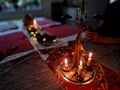 a traditional Christmas table with a metal tree and candles