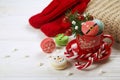 Traditional christmas themed french macaroons sweets in the form of snowman, snowflake, christmas tree and santa`s belly with can Royalty Free Stock Photo