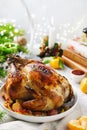 Traditional Christmas whole baked chicken with apples and thyme