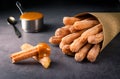 Traditional Churros with sugar and dulce de leche