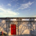 Traditional classic chinese red wood door and ancient brick wall in house, Beijingcity, China Royalty Free Stock Photo