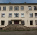Traditional classic European Soviet school building facade with windows