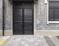 Traditional classic wood door and window and brick wall in ancient chinese house, shanghai city, china Royalty Free Stock Photo