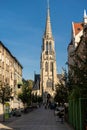 Traditional classical interior of Catholic cathedral on the city streets. European building of church with towers.