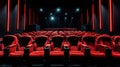 Traditional classically regal ornate rounded wood armed formal plush deep red velvet opera movie theater chairs in Royalty Free Stock Photo