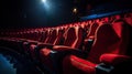 Traditional classically regal ornate rounded wood armed formal plush deep red velvet opera movie theater chairs in