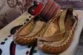 Traditional clothes and footwear and jewelry of Serbian folklore. Royalty Free Stock Photo