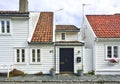 Traditional cobblestone street with wooden houses in the old town of Stavanger, Norway