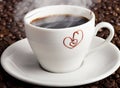 Coffee Cup With Heart-Shaped Steam with coffee beans around Royalty Free Stock Photo