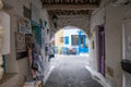 Traditional coffee shop with blue chairs at mediterranean island. Tzia, Kea, Cyclades, Greece Royalty Free Stock Photo