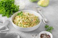 Traditional cole slaw salad in a bowl on a gray concrete background. Salad with cabbage, carrot and mayonnaise sauce. Royalty Free Stock Photo