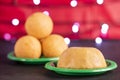 Traditional Colombian bunuelos Deep Fried Cheese Bread and natilla on christmas. Text space Royalty Free Stock Photo