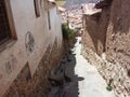 Traditional colonial style street. Stone staircase on the street of the old city of Cusco
