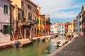 Traditional colored houses and chanal with boats on the island of Burano, Italy Royalty Free Stock Photo