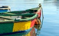 Traditional colorful boats luzzu at the port of Marsaxlokk, Malta. Copy space, closeup view Royalty Free Stock Photo
