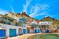 Traditional colorful fishing village, boat house, Milos island, Greece. Royalty Free Stock Photo