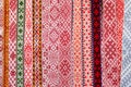 Traditional colorful handmade woven Baltic national patterned fabric belts background