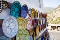 Traditional colorful pottery plates hanging on a wall Royalty Free Stock Photo