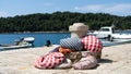 Traditional Colorful Ã¢â¬â red and white and blue- fabric material cover rope and net to fishing and dock boat in a small pavement