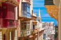 Traditional colorful wooden balconies, Malta