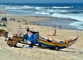 Colourful wooden fishing boats on Portugals west coast beach Royalty Free Stock Photo