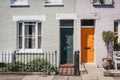 Traditional colourful bright doors on houses in Barnes, London,