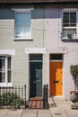 Traditional colourful bright doors on houses in Barnes, London, Royalty Free Stock Photo