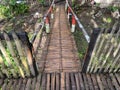 Bamboo bridge in the park with some paint decoration Royalty Free Stock Photo