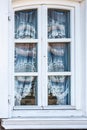 Traditional convex windows in half-timbered house in Hunspach Royalty Free Stock Photo