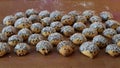 Traditional cookies looking like hedgehogs on a wooden table baked for the Christmas party