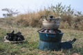 Traditional cooking charcoal and potbelly stove in Africa on nature